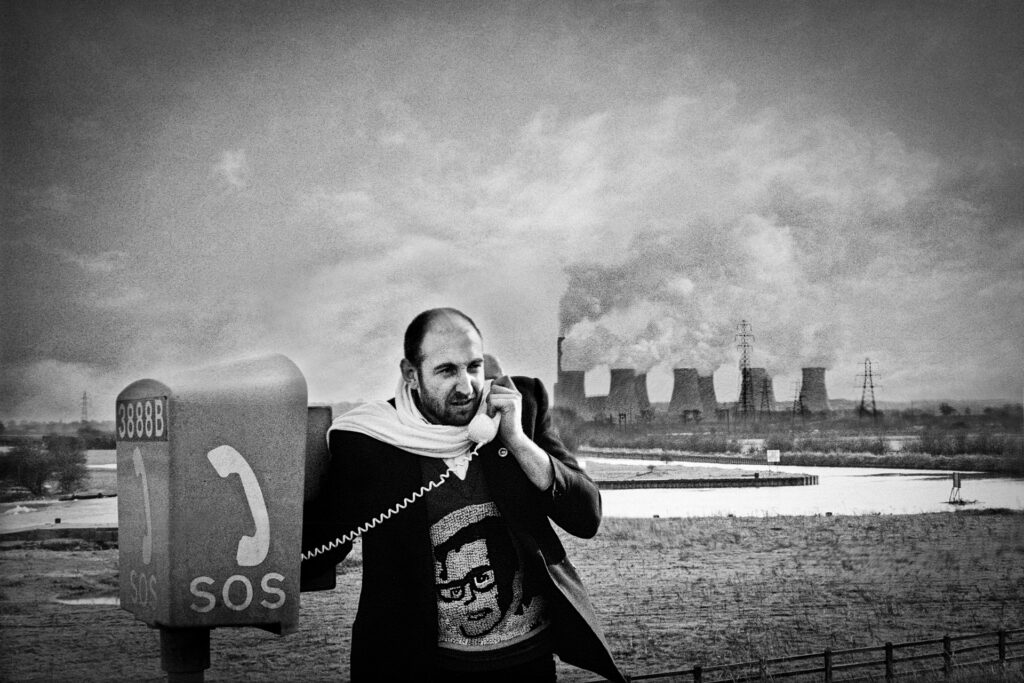 The van breaks down outside of Sheffield, phone and chimneys just happen to be there -  
Nuclear tour 1979